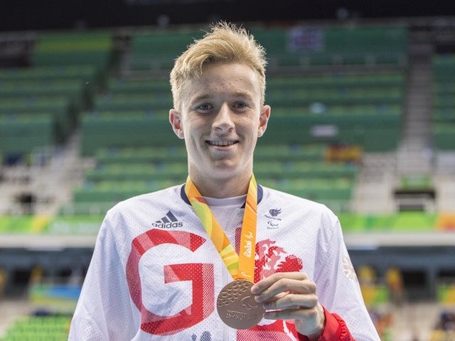 Lewis White poses with his bronze medal after the 400m freestyle S9 final at the Paralympic Games in Rio de Janeiro on September 9, 2016