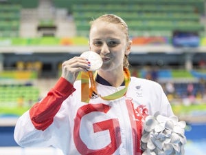 Stephanie Slater poses with her silver medal after the women's 100m butterfly S8 final at the Paralympic Games in Rio de Janeiro on September 9, 2016
