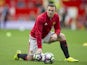 Wayne Rooney warms up prior to the game between Manchester United and Leicester City on September 24, 2016