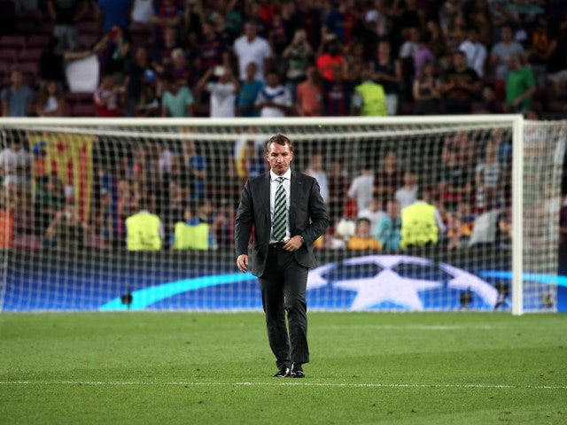 Celtic manager Brendan Rodgers on the Camp Nou pitch after watching his side lose 7-0 to Barcelona in the Champions League on September 13, 2016
