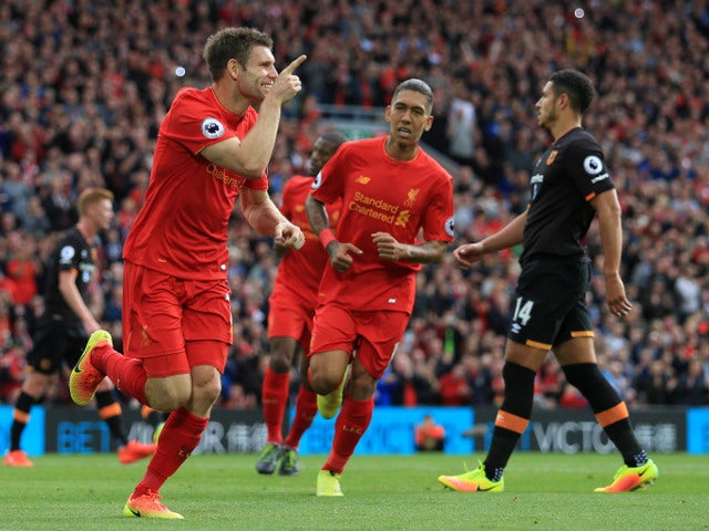 Liverpool's James Milner celebrates after scoring during the Premier League clash between Liverpool and Hull City at Anfield on September 24, 2016
