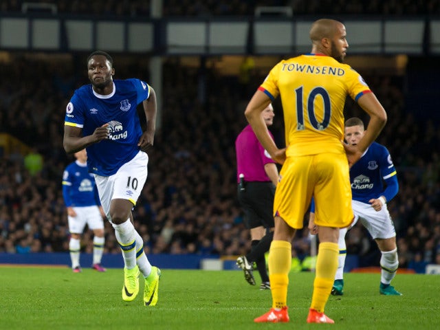 Everton striker Romelu Lukaku celebrates after scoring the opening goal in his side's 1-1 draw with Crystal Palace at Goodison Park on September 30, 2016