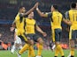Theo Walcott celebrates scoring during the Champions League game between Arsenal and Basel on September 28, 2016