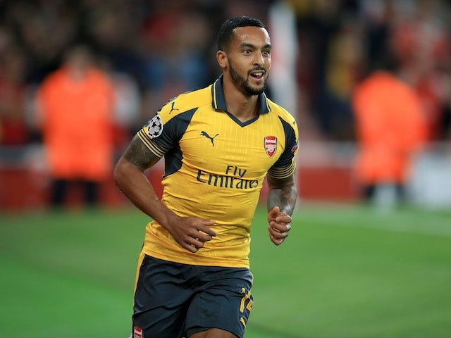 Result: Theo Walcott hat-trick helps Arsenal into last 16 of