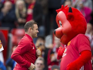 Wayne Rooney talks tactics with the United mascot on September 24, 2016