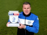 David Flitcroft poses with his Manager of the Month award for September 2016