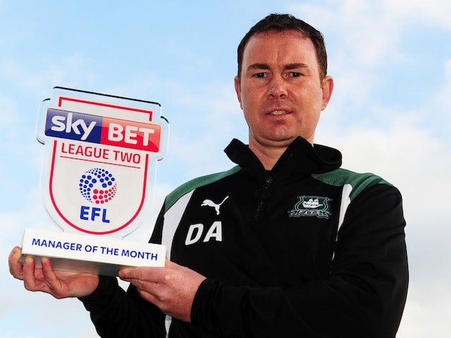 Derek Adams poses with his Manager of the Month award for September 2016