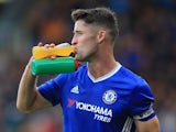 Gary Cahill demonstrates his remarkable drinking skills during the Premier League game between Hull City and Chelsea on October 1, 2016