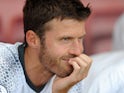 Manchester United midfielder Michael Carrick sits on the bench during his side's Premier League clash with Bournemouth on August 14, 2016