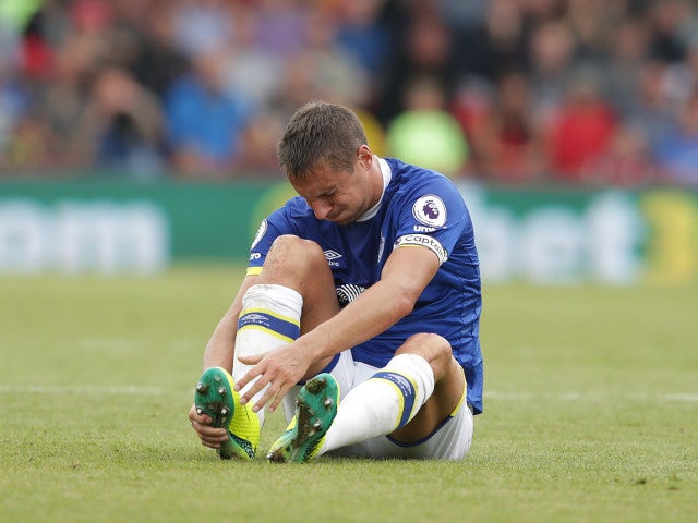 Everton captain Phil Jagielka goes down hurt during the Premier League match against Bournemouth at the Vitality Stadium on September 24, 2016