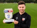 Scott Hogan poses with his Player of the Month award for September 2016