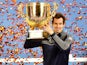 Andy Murray holds up his champion trophy at the China Open tennis tournament in Beijing on October 9, 2016