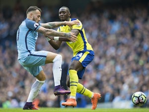 Manchester City defender Nicolas Otamendi fights for the ball against Everton midfielder Yannick Bolasie on October 15, 2016