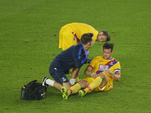 Crystal Palace defender Scott Dann goes down injured during the EFL Cup match against Southampton at St Mary's on September 21, 2016