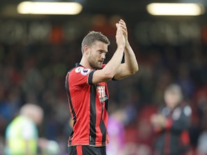Bournemouth defender Simon Francis applauds following his side's 6-1 victory over Hull City at the Vitality Stadium on October 15, 2016