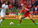Wales's David Edwards and Georgia's Tornike Okriashvili during the 2018 World Cup qualifier on October 9, 2016