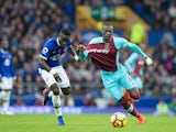 Everton midfielder Idrissa Gana Gueye tussles with West Ham United's Pedro Obiang during their Premier League clash at Goodison Park on October 30, 2016