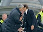 Jose Mourinho borrows old pal Wenger's coat to attend the Premier League game between Chelsea and Manchester United on October 23, 2016