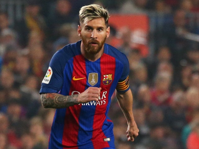 Messi fires Barca top of La Liga