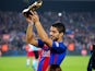 Barcelona forward Luis Suarez proudly holds aloft his Golden Boot prior to his side's La Liga clash with Granada on October 29, 2016