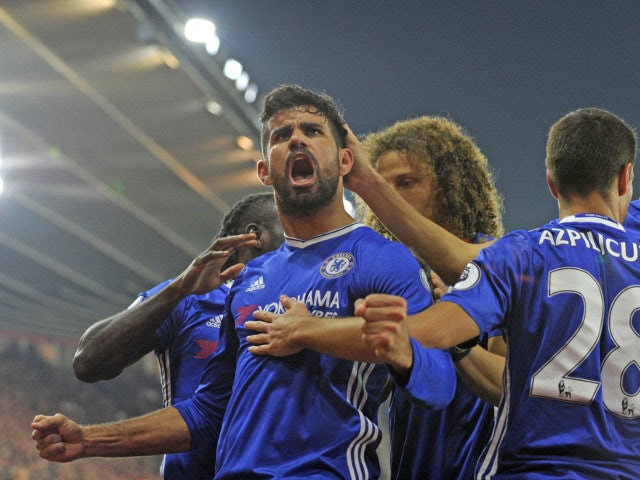Diego Costa of Chelsea celebrates with teammates after scoring during his side's Premier League clash with Southampton at St Mary's on October 30, 2016