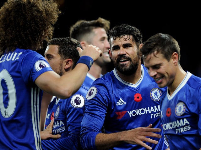 Diego Costa celebrates with Chelsea teammates after scoring during his side's victory over Everton at Stamford Bridge on November 5, 2016