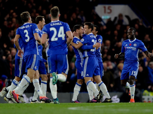Eden Hazard celebrates with Chelsea teammates after scoring during his side's victory over Everton at Stamford Bridge on November 5, 2016