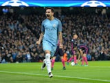 Manchester City midfielder Ilkay Gundogan peels away to celebrate after scoring during his side's Champions League clash with Barcelona at the Etihad Stadium on November 1, 2016