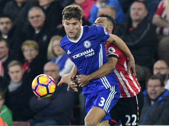 Marcos Alonso of Chelsea holds off the challenge of Nathan Redmond during his side's Premier League clash with Southampton at St Mary's on October 30, 2016