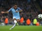 Manchester City winger Raheem Sterling crosses the ball during his side's Champions League clash with Barcelona at the Etihad Stadium on November 1, 2016