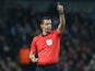 Referee Viktor Kassai in action during the Champions League clash between Manchester City and Barcelona at the Etihad Stadium on November 1, 2016