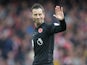Referee Mark Clattenburg gestures during the North London derby between Arsenal and Tottenham Hotspur at the Emirates Stadium on November 6, 2016