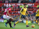 Alexis Sanchez and Antonio Valencia in action during the Premier League game between Manchester United and Arsenal on November 19, 2016