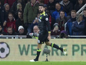 Costa fires Chelsea top of the table