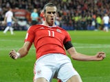 Wales winger Gareth Bale celebrates after scoring during his side's World Cup qualifier with Serbia on November 12, 2016