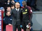 Pep Guardiola has a word with Yaya Toure during the Premier League game between Crystal Palace and Manchester City on November 19, 2016