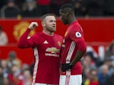 Wayne Rooney has a word with Paul Pogba during the Premier League game between Manchester United and Arsenal on November 19, 2016