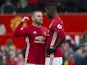 Wayne Rooney has a word with Paul Pogba during the Premier League game between Manchester United and Arsenal on November 19, 2016