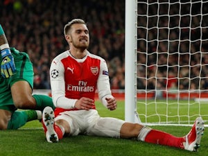 Aaron Ramsey takes a seat during the Champions League game between Arsenal and PSG on November 23, 2016