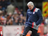 Stoke City manager Mark Hughes watches on during his side's Premier League clash with Bournemouth at the bet365 Stadium on November 19, 2016