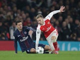 Thiago Motta and Aaron Ramsey in action during the Champions League game between Arsenal and PSG on November 23, 2016