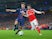 Thomas Meunier and Mesut Ozil in action during the Champions League game between Arsenal and PSG on November 23, 2016