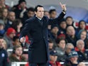 Unai Emery watches on during the Champions League game between Arsenal and PSG on November 23, 2016