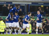 Ashley Williams celebrates with teammates after scoring during the Premier League game between Everton and Arsenal on December 13, 2016