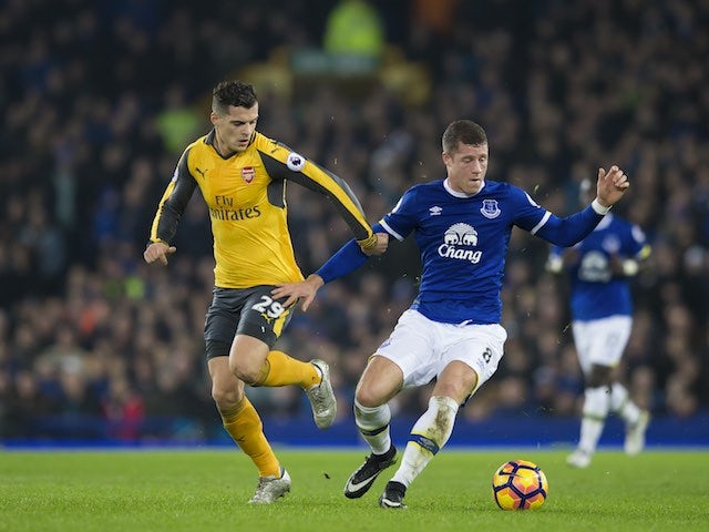 Ross Barkley fends off Granit Xhaka during the Premier League game between Everton and Arsenal on December 13, 2016