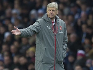 Arsene Wenger 'to sit with Chelsea fans'