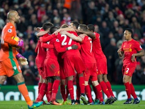 Liverpool move back up to second