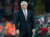 Stoke City manager Mark Hughes watches on during his side's Premier League clash with Liverpool at Anfield on December 27, 2016