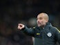 Manchester City manager Pep Guardiola watches on during his side's Premier League clash with Hull City at the Etihad Stadium on Boxing Day