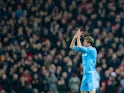 Stoke City striker Peter Crouch applauds the fans after being taken off during his side's Premier League clash with Liverpool at Anfield on December 27, 2016